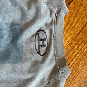 YL Under Armour dry fit shirt. No pics or stains.